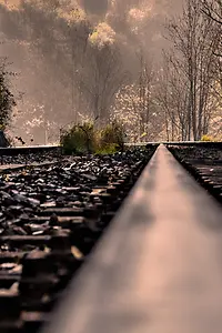 Close view of an iron track on the railway track