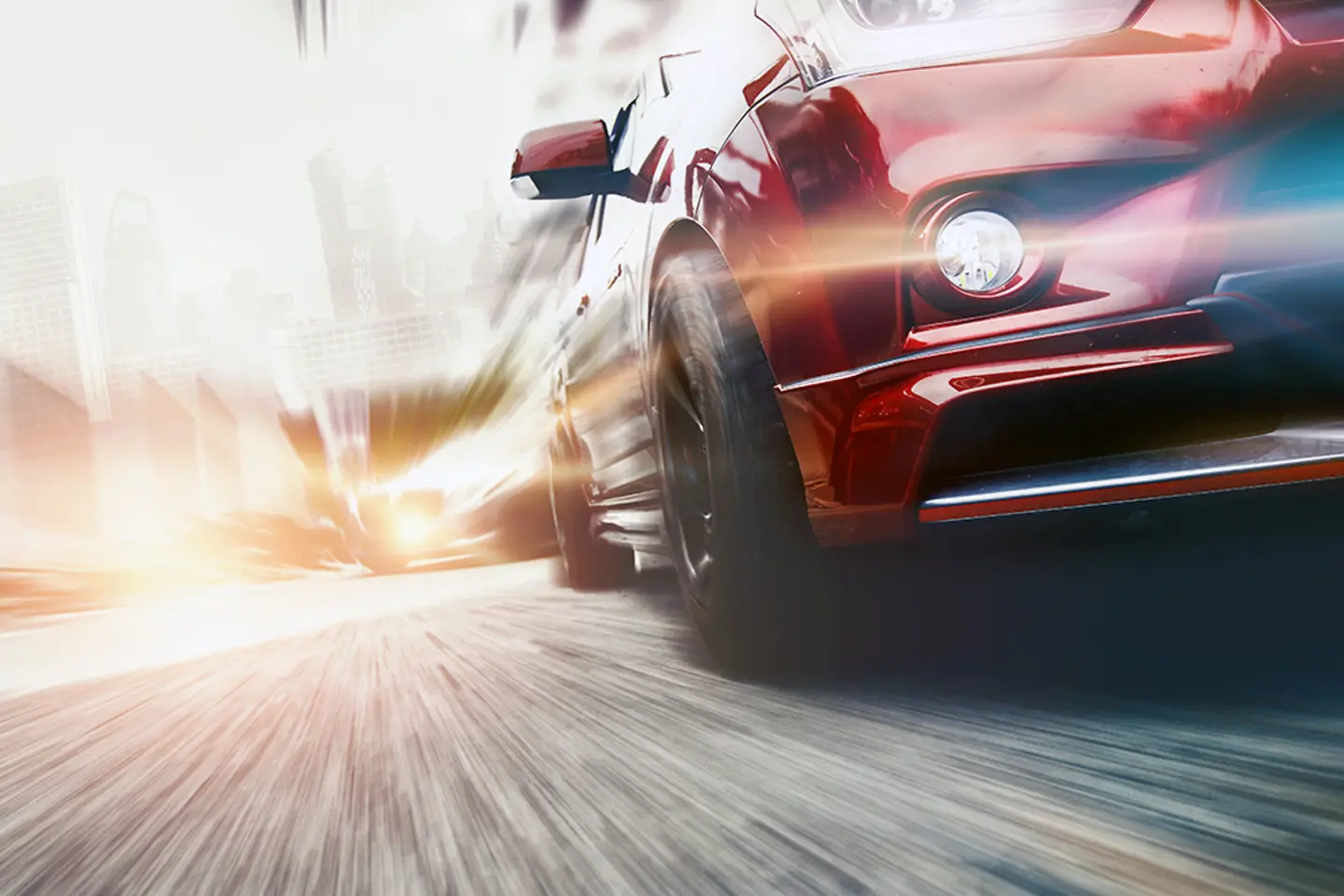 A red car driving fast on the road