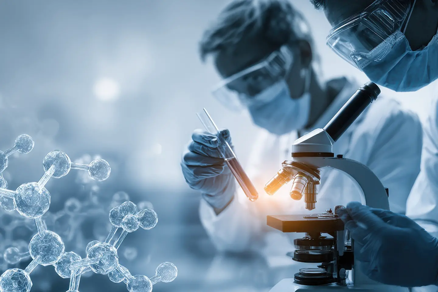 Scientists looking at a vial and a microscope
