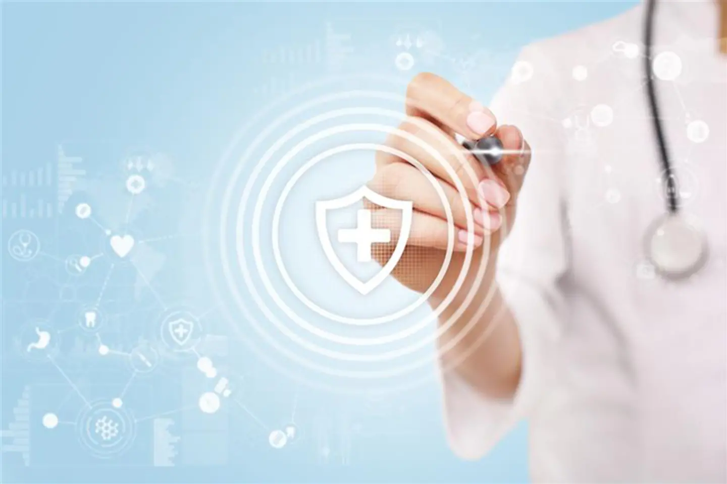 A pen, held by a doctor, pointing at a virtual screen